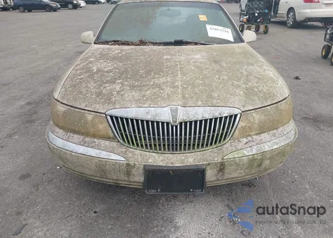 1999 Lincoln Continental z USA, uszkodzony, nr VIN 1LNHM97V1XY697540